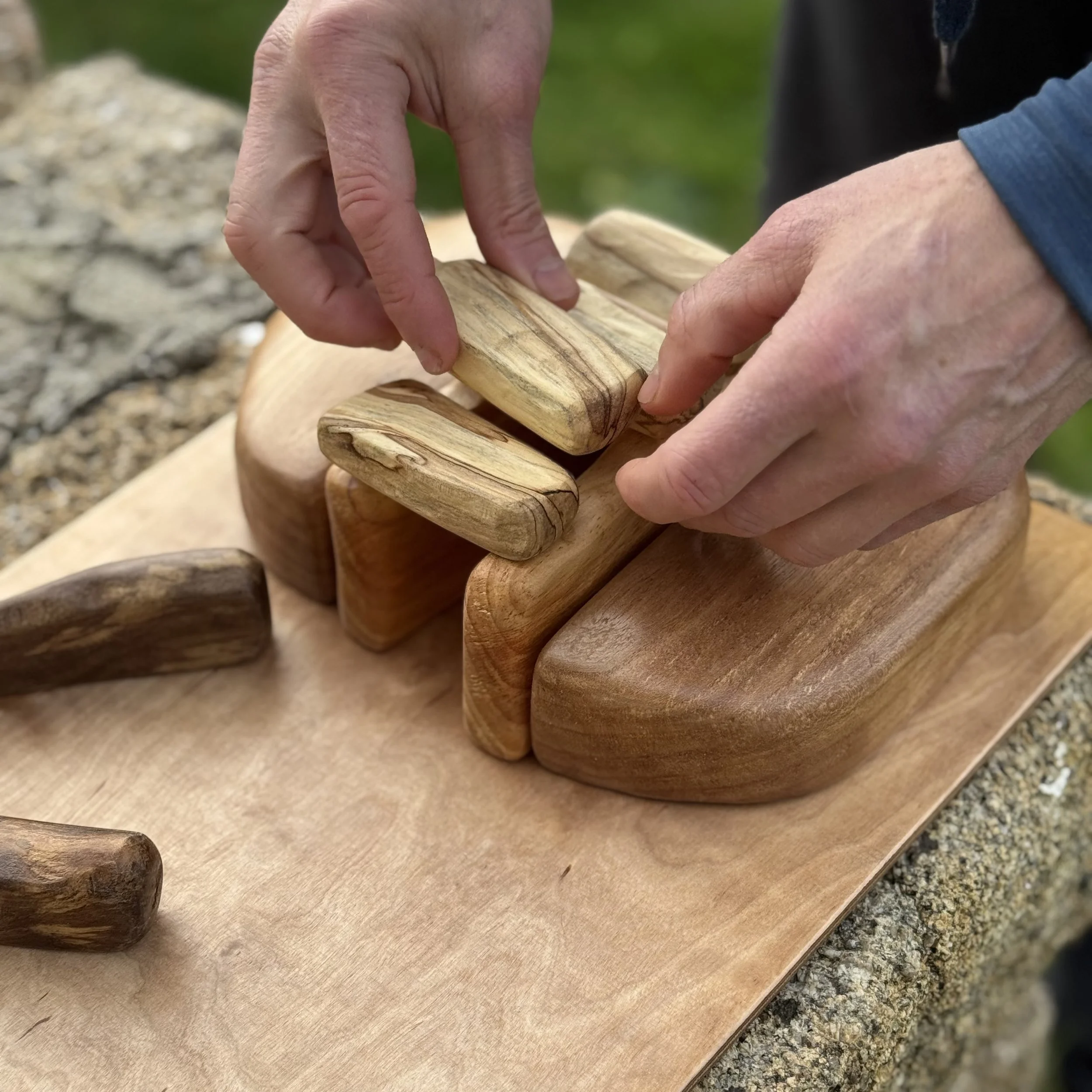  After several visits to Bant’s Carn, and studying aerial photos and English Heritage charts, Piers recreated the entrance grave in eleven beautifully carved, sanded and oiled pieces, all made by hand in his workshop on St Agnes. 